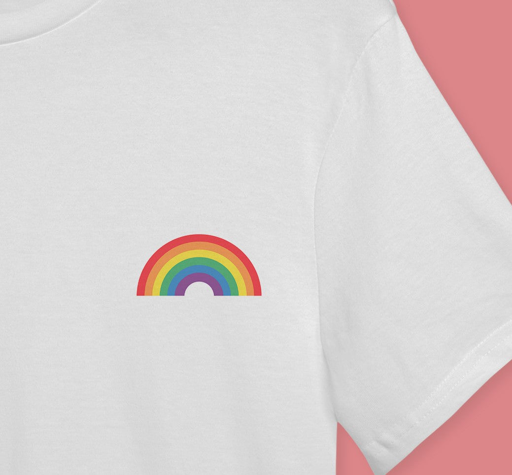 Close up image of a white t-shirt with the six colour pride rainbow on the right hand side of the chest.